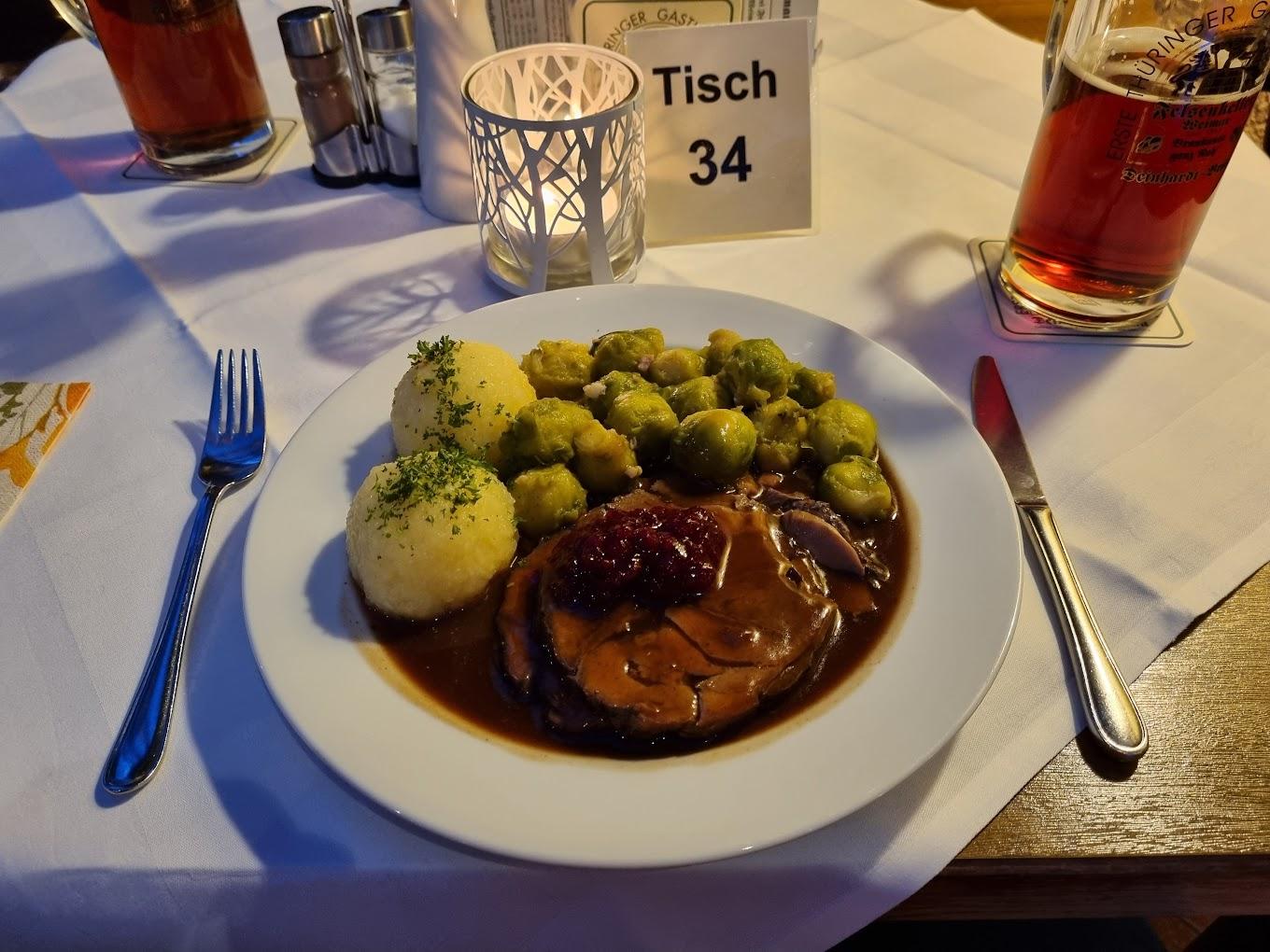 A plate of food on a table

AI-generated content may be incorrect.