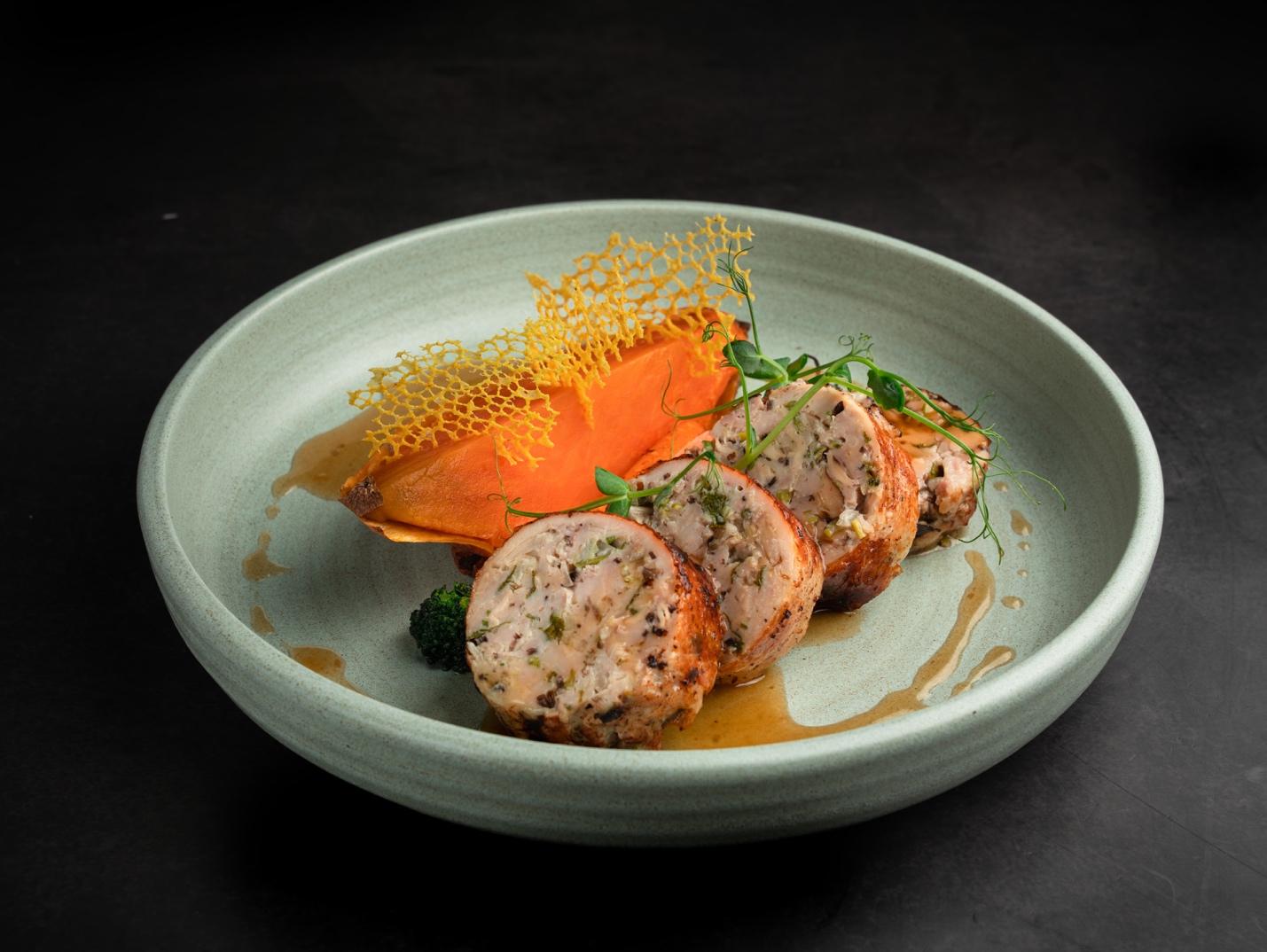 A plate of food on a black surface

AI-generated content may be incorrect.
